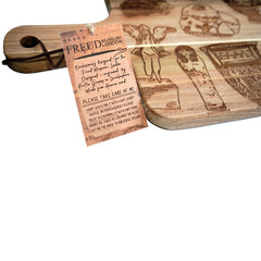 Wooden product with engraved designs and a tag labeled 'Freud Museum London' on a white background.