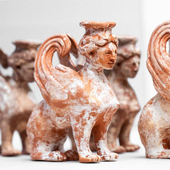 Replica of sigmund Freud's sphinx by artist Sun Ae Kim - group photo of sphinxes