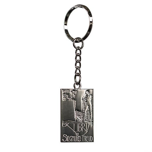 A silver keyring with a basic line drawing of Oedipus solving the riddle of the Sphinx from greek mythology. Underneath, it says "Ex Libris Sigmund Freud"